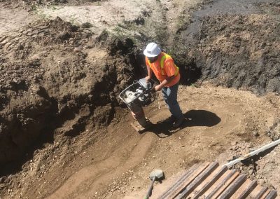 Excavation Crew Memeber at Next Construction